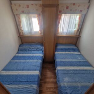 Habitación camas paralelas